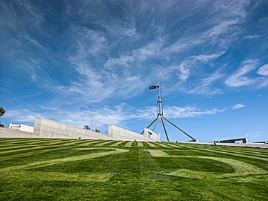 view to Parliament House from the lake